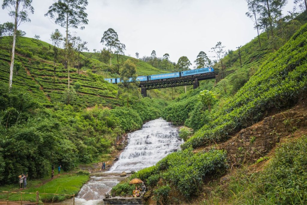 Train crossing above a waterfall in Sri Lanka’s tea country