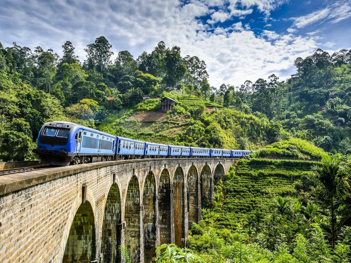 Train crossing Nine Arch Bridge in Ella, Sri Lanka