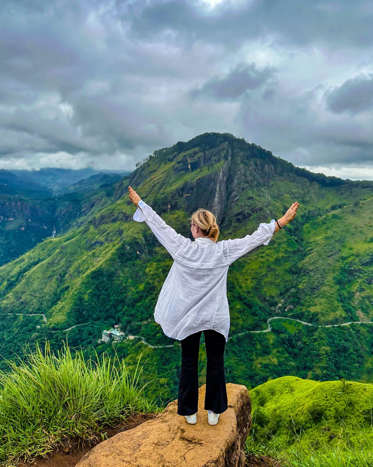 Traveller overlooking the mountain landscape of Ella, Sri Lanka